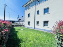 Garten - Ostseite VERKAUFT: Barrierefreie 5 ZKB-EG-Wohnung mit gro�em Garten, 2 Einzelgaragen und EBK nahe Ilsesee