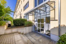 Hauszugang VERKAUFTt: Familiengerechte 4 ZKB-Wohnung im 1. OG mit EBK, Balkon und TG-Stellplatz zum Kauf